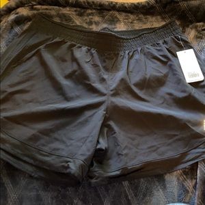 NWT mid rise black New Balance running shorts